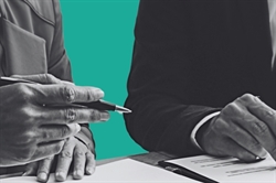 [ai] Close-up of two hands, one holding a pen and the other resting on a document. A teal background contrasts with the black and white image, emphasizing the details of the hands engaged in a signing or reviewing process.